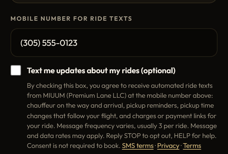The same Trip details step on a phone: the mobile number field, the unchecked text message box and its disclosure.